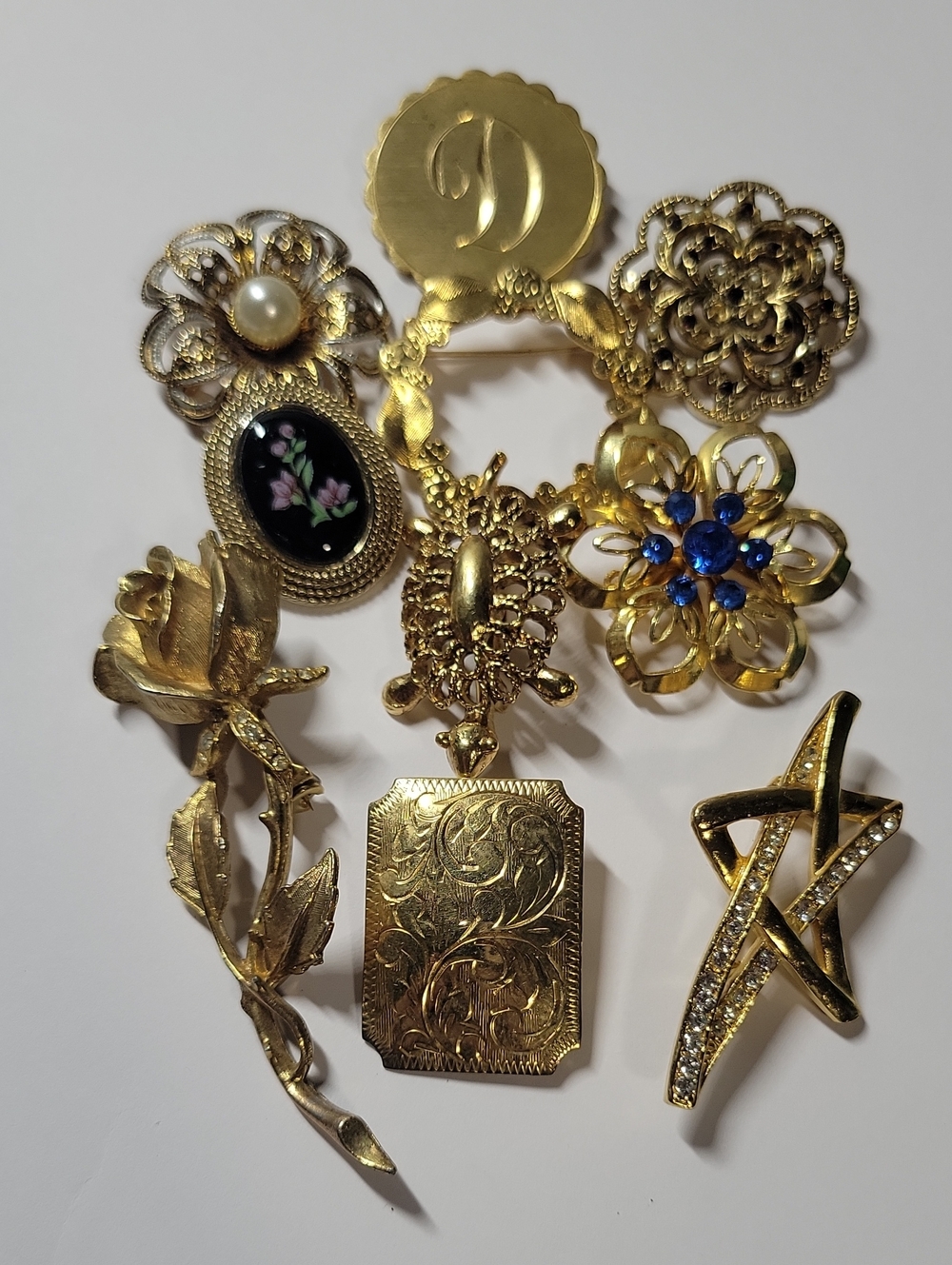 Gold Tone Women’s Vintage-Style 10 Brooch Collection with Blue Accents